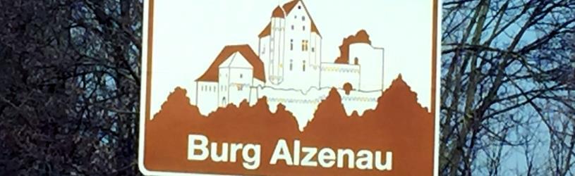 Observation durch Privatdetektive in Alzenau. Kulturschild Burg Alzenau als Synonym für Detektivarbeit