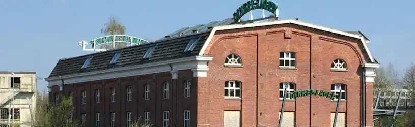 Gebäudekomplex in Gronau als Symbol für einen Privatdetektiv Gronau, der Ermittlungen in der Stadt, dem Kreis Borken und überregional durchführt.